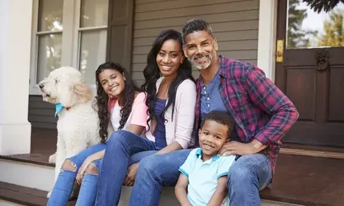 Picture, happy African American family at home, EnerWisely, Compare Electricity Plans and Rates to Save Money. It's Free