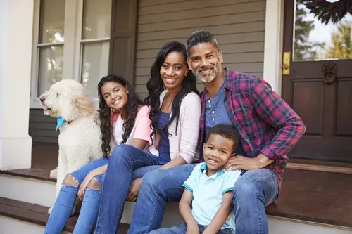 Picture, happy African American family at home, EnerWisely, Compare Electricity Plans and Rates to Save Money. It's Free