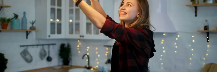 Young woman smiling, light bulbs, Compare light plans, switch and save up to thousands, Pulse Power, EnerWisely, Texas