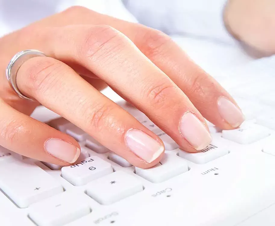 Photo, hands in keyboard, EnerWisely, partner with us, let's make climate action everyone's superpower